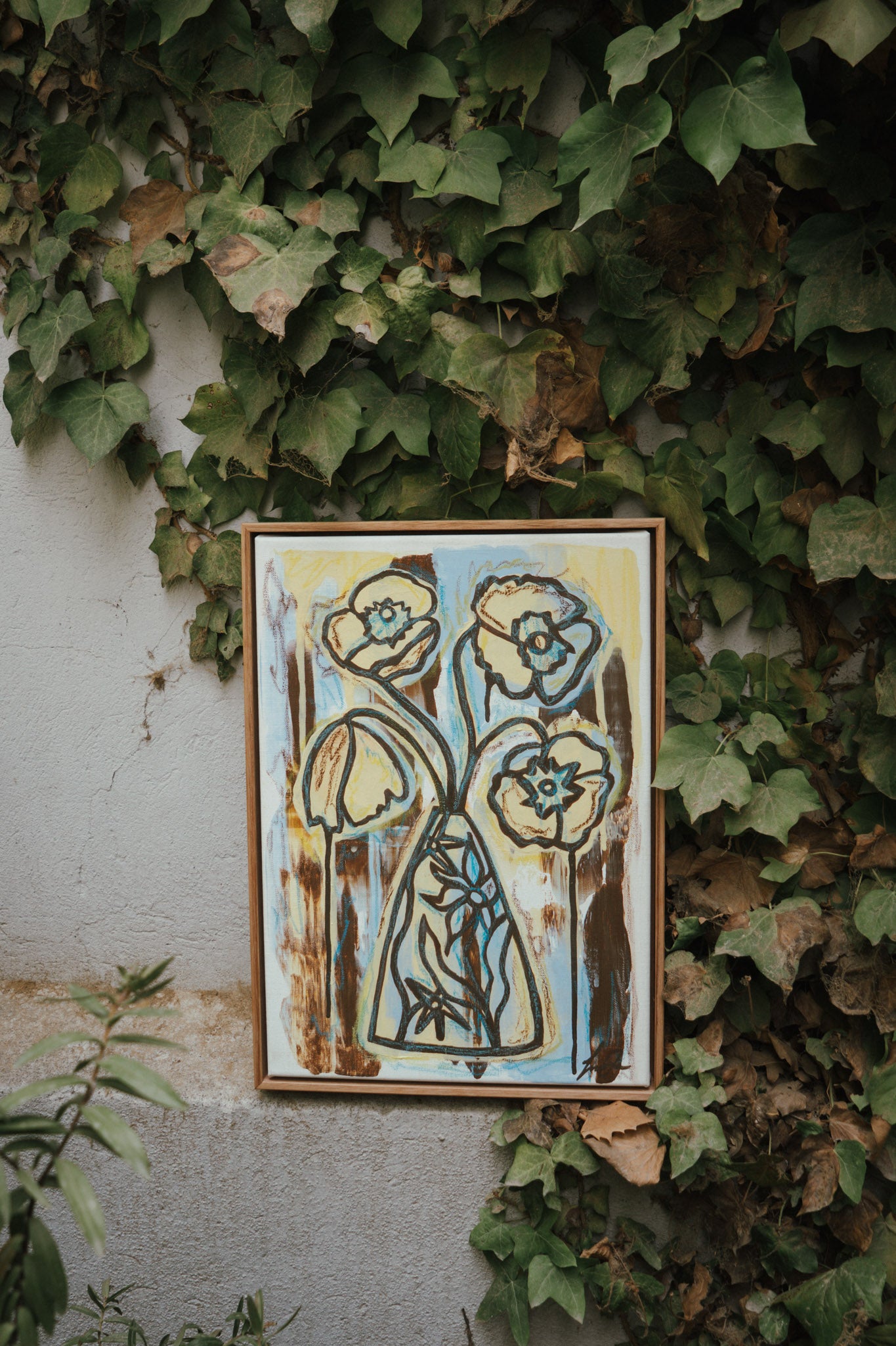Framed artwork of flowers in a vase hand painted by Melbourne artist