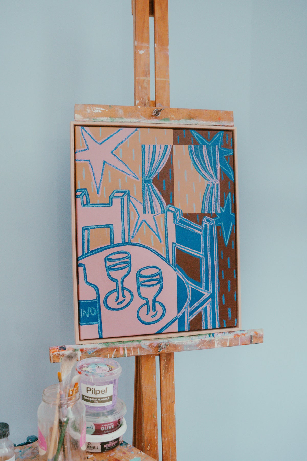 A framed original wall art painting feating a bar scene by local Melbourne artist Jay-Dee Pitcaithly